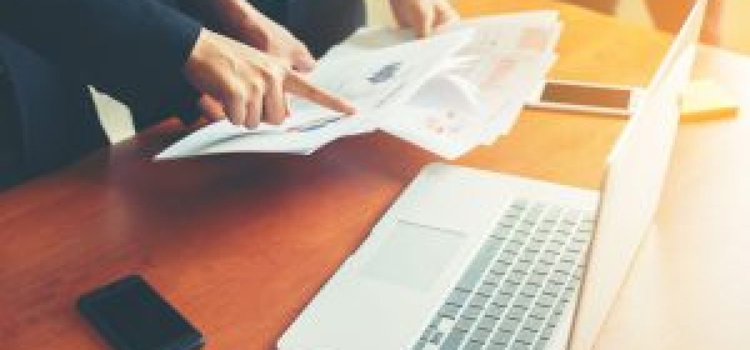 workers-comparing-results-documents-300x200
